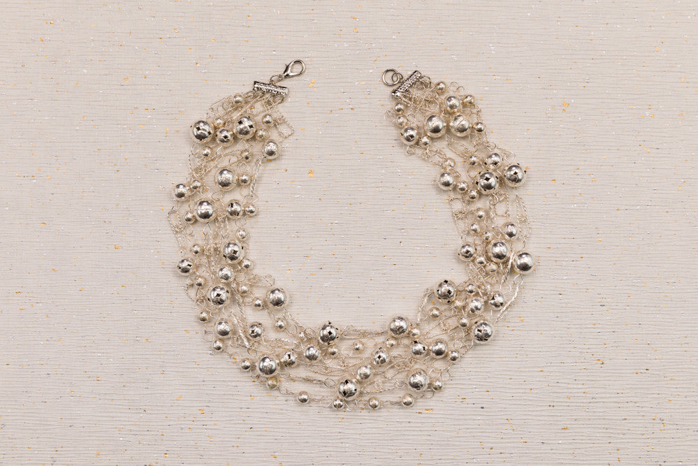 The World Goes Round and Round Necklace